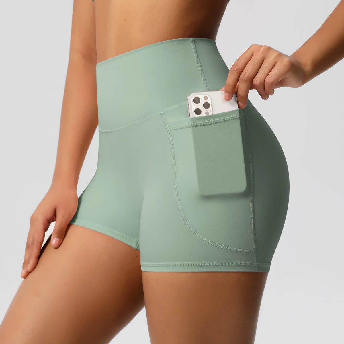 Rooftrellen High-Waist Pocketed Sports Shorts for Women – Quick-Dry Fitness Leggings